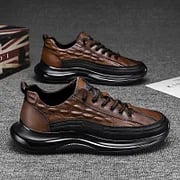 Braune Air-Cushion-Sneaker aus Leder, rutschfeste Sohle, Herrenmode, bequemes Design.