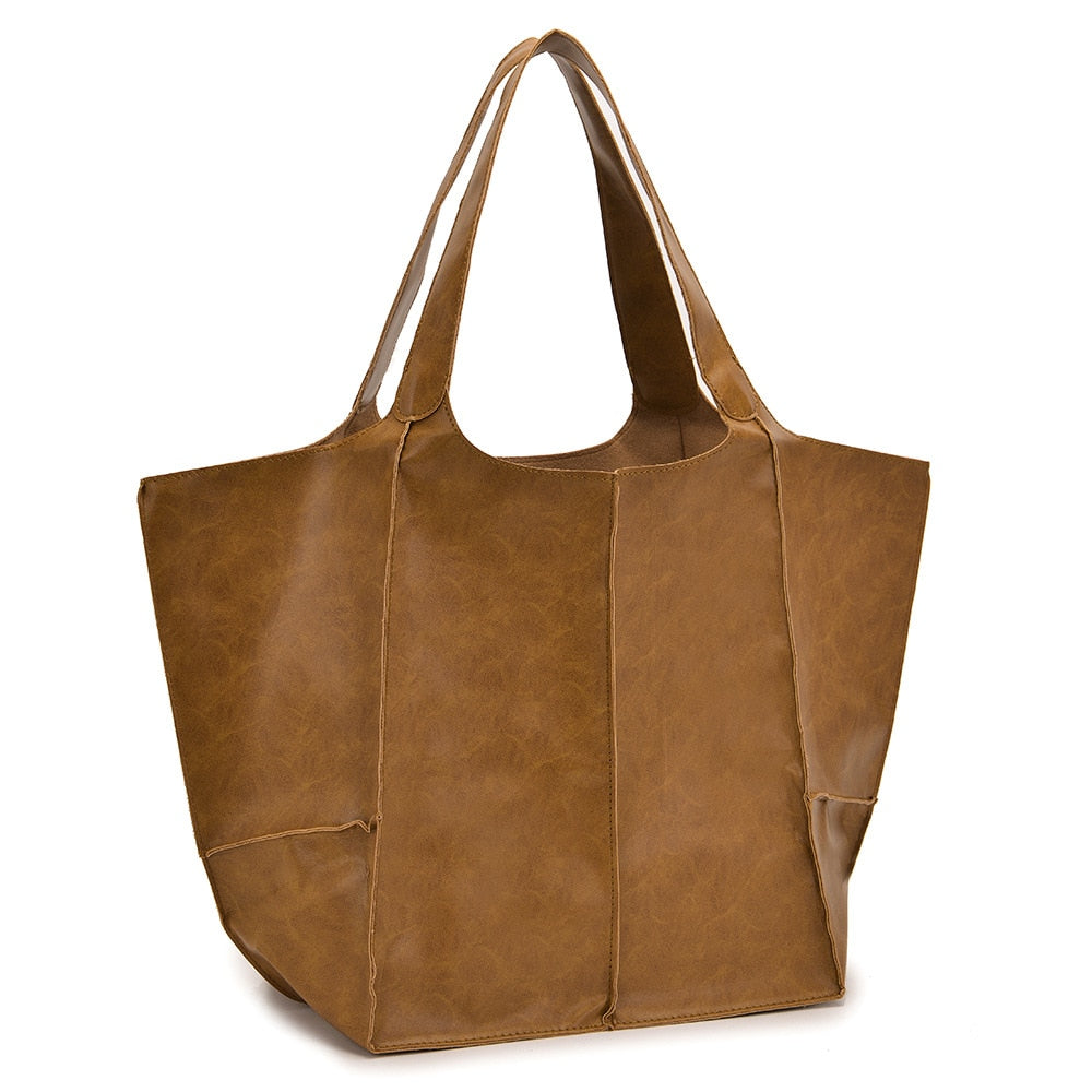 Braune Lederhandtasche, geräumig, modisch, für Damen, ideal für Alltag und Büro.