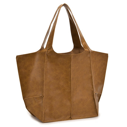 Braune Lederhandtasche, geräumig, modisch, für Damen, ideal für Alltag und Büro.