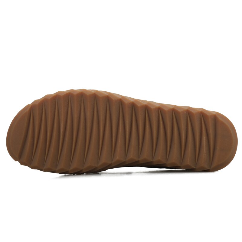 Braune Gummisohle mit Rillenmuster, rutschfest, für Schuhe, langlebig und strapazierfähig.