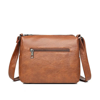 Braune Leder-Umhängetasche mit Reißverschluss, modisch, Damen, elegant, vielseitig.