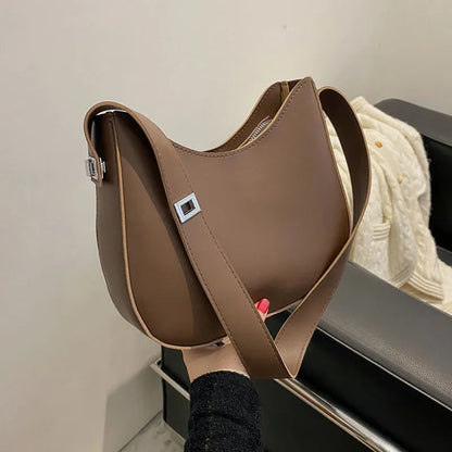 Braune Umhängetasche aus Leder, modisch, Damenaccessoire, elegantes Design, Alltagsgebrauch.