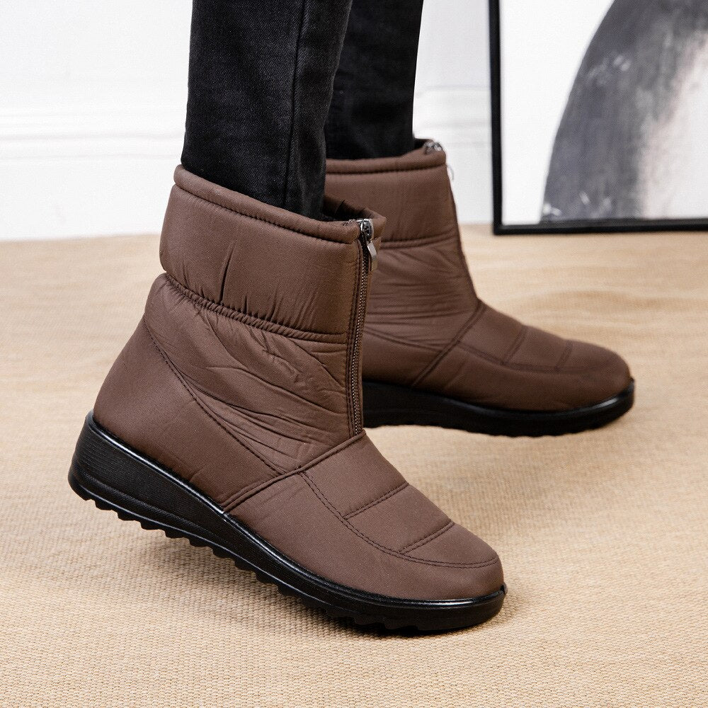 Braune Winterstiefel mit Reißverschluss, warm gefüttert, rutschfeste Sohle, Damenmode.