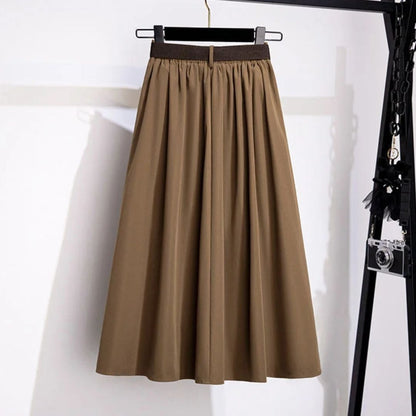 Brauner Faltenrock Damen, knielang, elegant, aus Baumwolle, modisch, vielseitig einsetzbar.