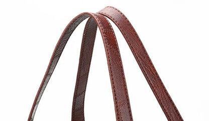 Brauner Ledergürtel, schmal, elegant, hochwertig, modisches Accessoire für Damen und Herren.