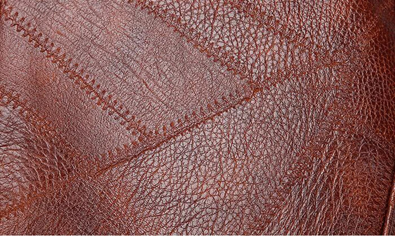 Braunes Leder mit Ziernähten, Nahaufnahme, Textur, hochwertiges Material, Polsterung.