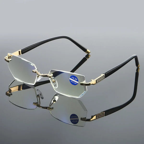 Goldene randlose Lesebrille, rechteckig, +2.50 Dioptrien, schwarzer Bügel, Unisex-Design.