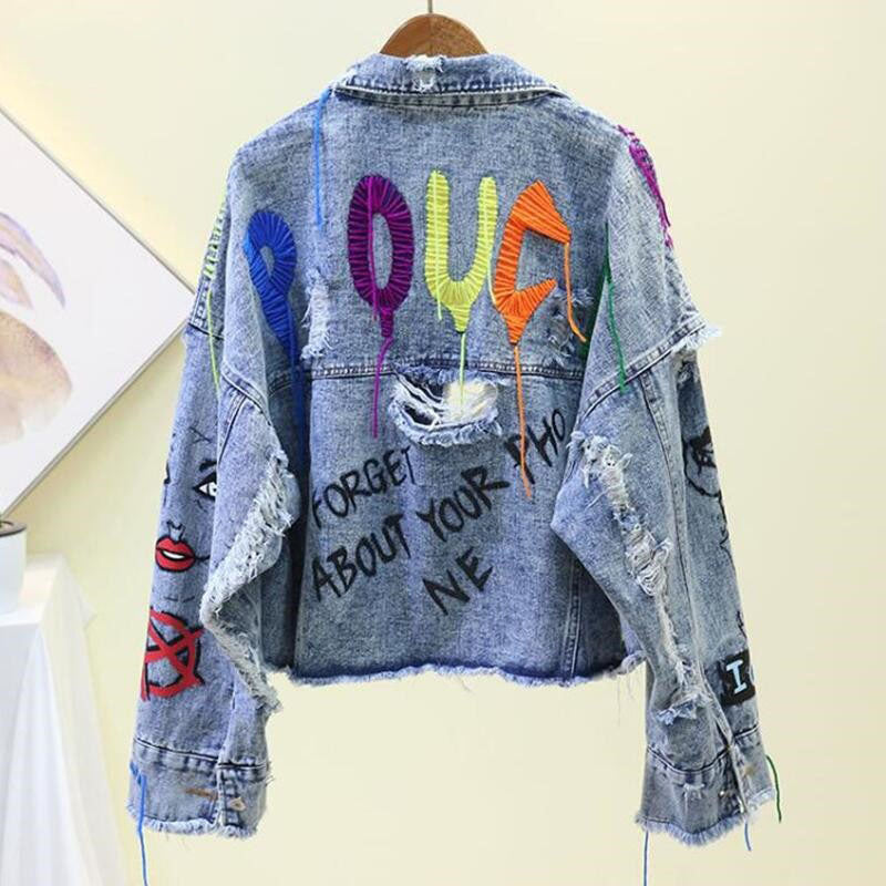 Bunte Jeansjacke mit Graffiti-Design, zerrissenem Look, Unisex, modisch, Streetwear.