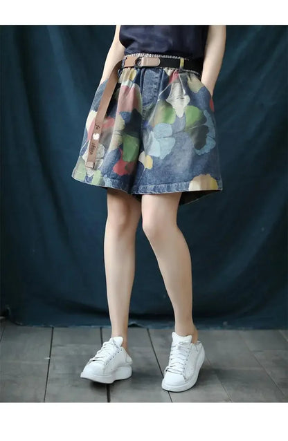 Damen Jeansrock mit buntem Blumenmuster, knielang, lässig, modisch, ideal für Sommer.