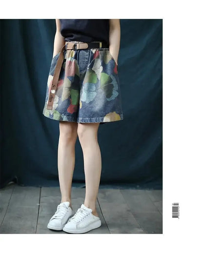 Damen-Jeansrock mit Blumenmuster, blau, knielang, lässig, mit Gürtel, modisch.