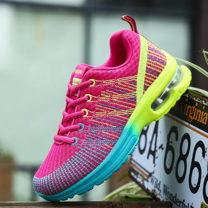 Bunter Sportschuh, pink-gelb-blau, atmungsaktiv, für Damen, mit Luftpolstersohle.