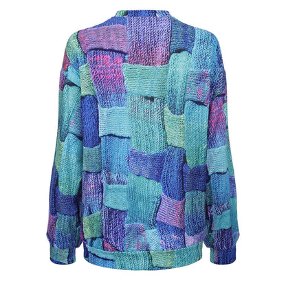 Bunter Strickpullover, Patchwork-Design, Blau- und Grüntöne, Damenmode, Herbst/Winter.