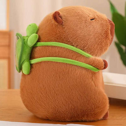 Braunes Capybara-Plüschtier mit grünem Rucksack, Kuscheltier, Geschenkidee, Kinderzimmer-Deko.