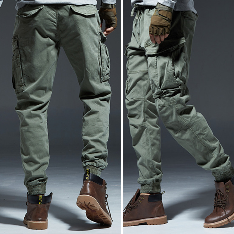 Grüne taktische Cargohose für Herren, robust, mit Seitentaschen, ideal für Outdoor-Aktivitäten.