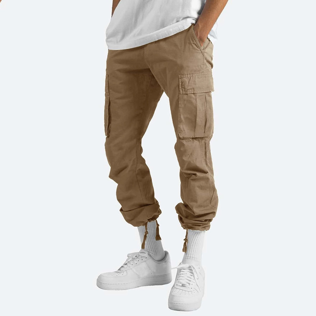 Beige Cargo-Hose für Herren, Baumwolle, mit Taschen, lässiger Stil, ideal für Freizeitkleidung.