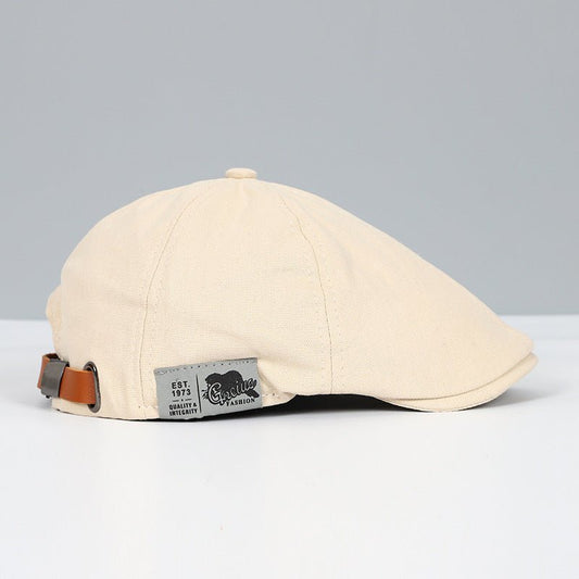 Beige Schiebermütze aus Baumwolle mit Lederriemen, Vintage-Design, Herrenmode Accessoire.
