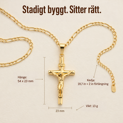 Guldkrucifix med figarokedja utlagt platt på beige bakgrund, med måttangivelser för hänge, kedja och vikt 6