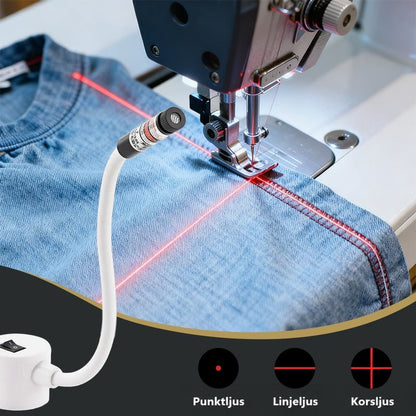 Laser på böjlig vit arm projicerar röda linjer över jeanstyg vid symaskinens nålplatta 1