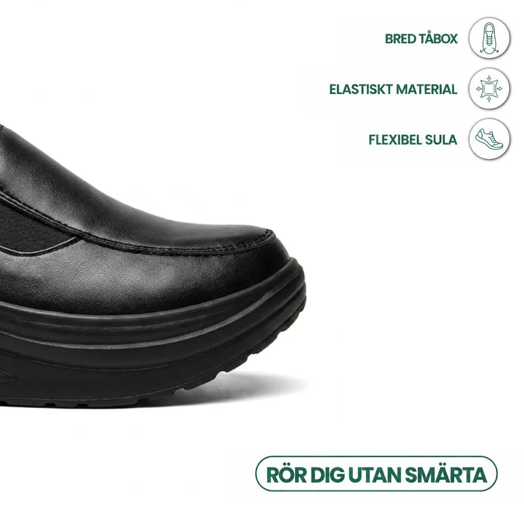 Närbild på den breda svarta skospetsen med ikoner för elastiskt material och flexibel sula 5