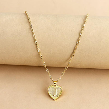 Goldene Herz-Halskette mit Anhänger, gedrehte Kette, eleganter Schmuck für Damen.