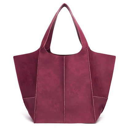 Bordeauxrote Damenhandtasche aus Leder, geräumig, modisch, ideal für Alltag und Büro.