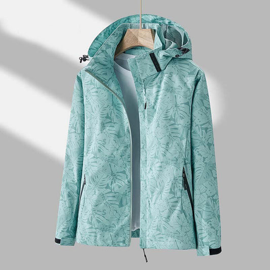 Damenjacke grün, wasserabweisend, mit Kapuze, Outdoor, atmungsaktiv, modisches Design.