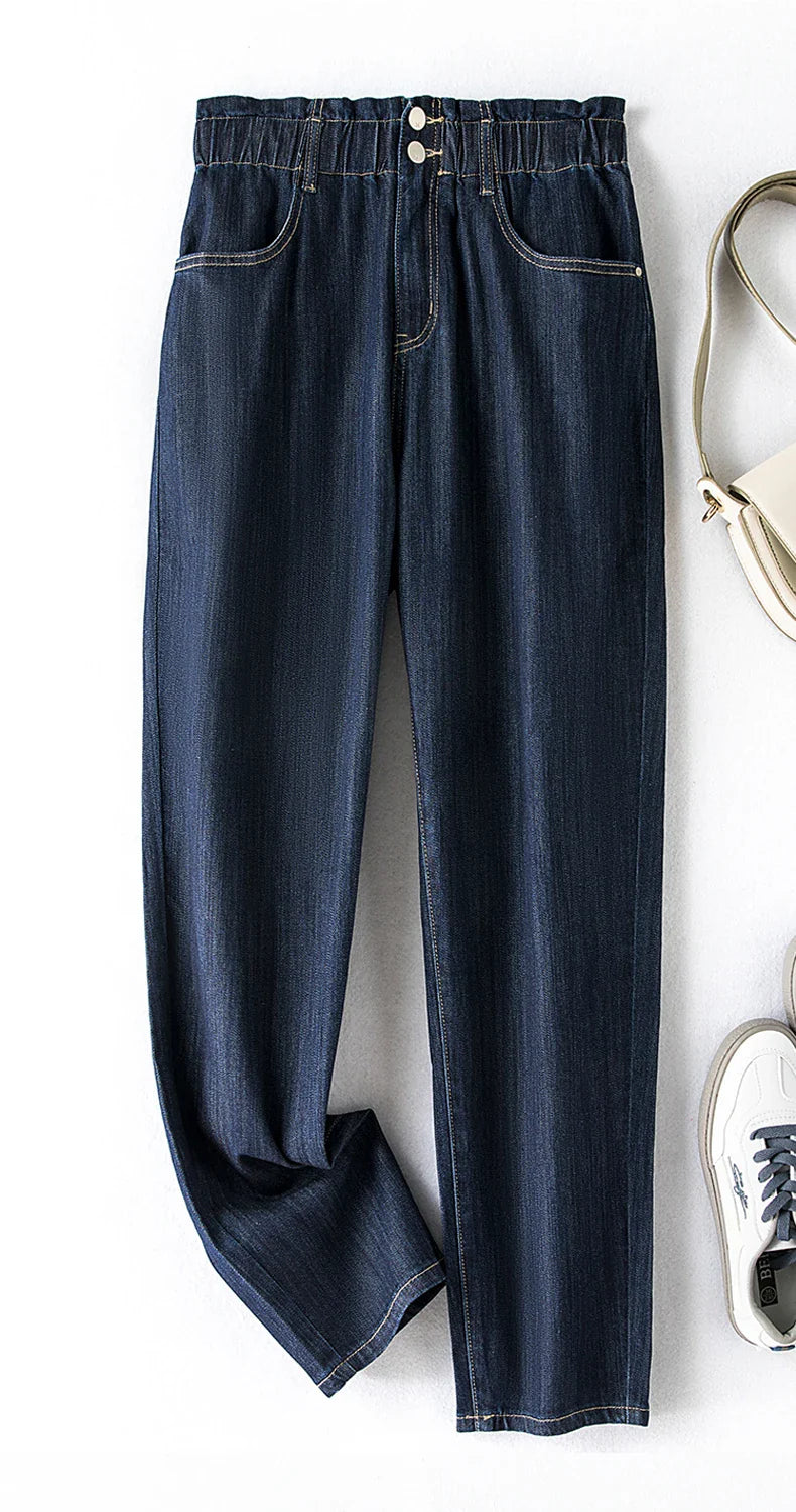 Dunkelblaue Damenjeans mit elastischem Bund, lässiger Stil, aus Denim, modisch und bequem.