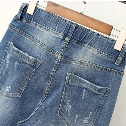Blaue Jeans mit Used-Look, Rückansicht, Taschen, Denim, lässige Mode, Damenbekleidung.