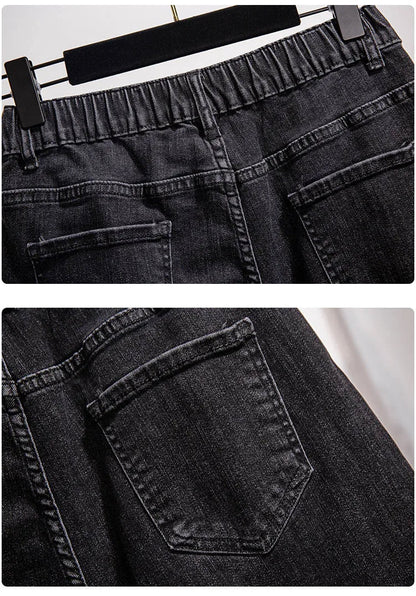 Dunkelgraue Jeans mit elastischem Bund und Gesäßtaschen, modische Damenbekleidung.
