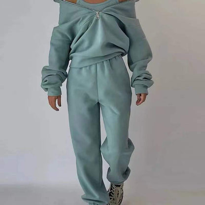 Damen Jogginganzug, hellblau, Off-Shoulder, Reißverschluss, bequem, modisch, Freizeitkleidung.
