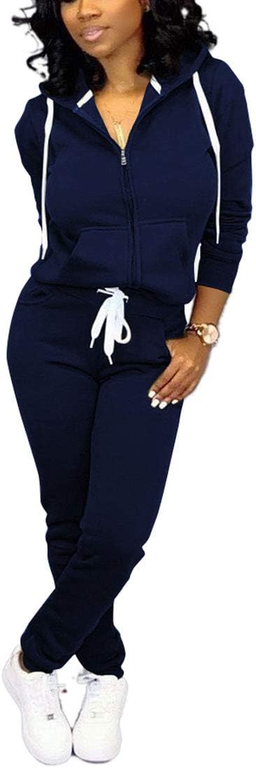 Damen Jogginganzug, dunkelblau, Kapuzenjacke mit Reißverschluss, weiße Sneakers, Freizeitmode.