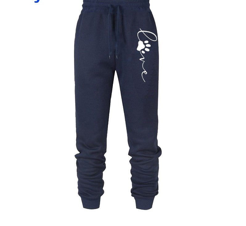 Dunkelblaue Jogginghose mit Pfotenabdruck und "love"-Schriftzug, Baumwolle, Unisex.