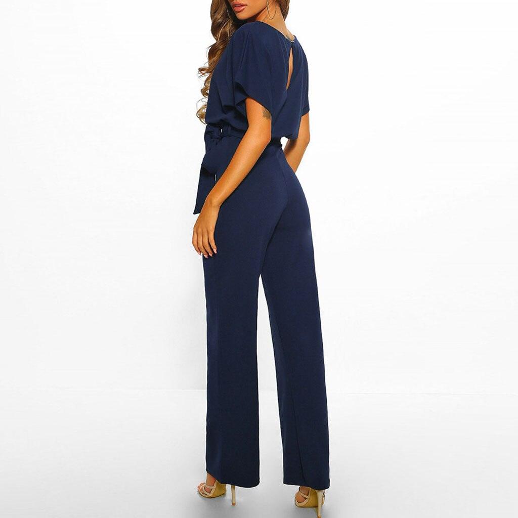 Damen Jumpsuit, dunkelblau, elegantes Design, Kurzarm, Gürtel, Abendmode, modisch.