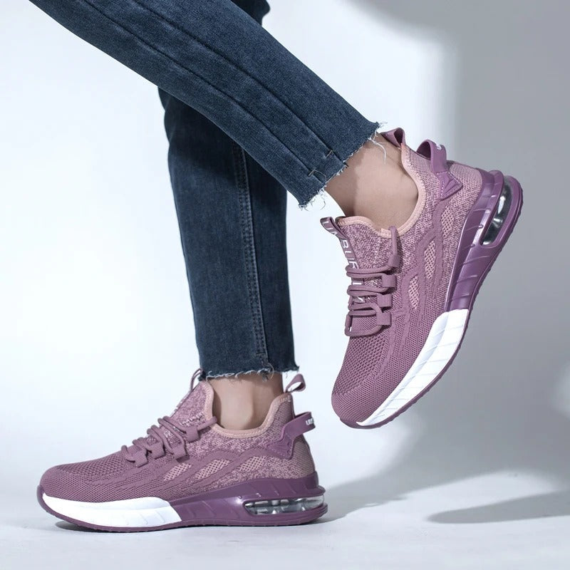 Lila Damen-Sneaker, atmungsaktiv, mit Luftpolstersohle, ideal für Sport und Freizeit.