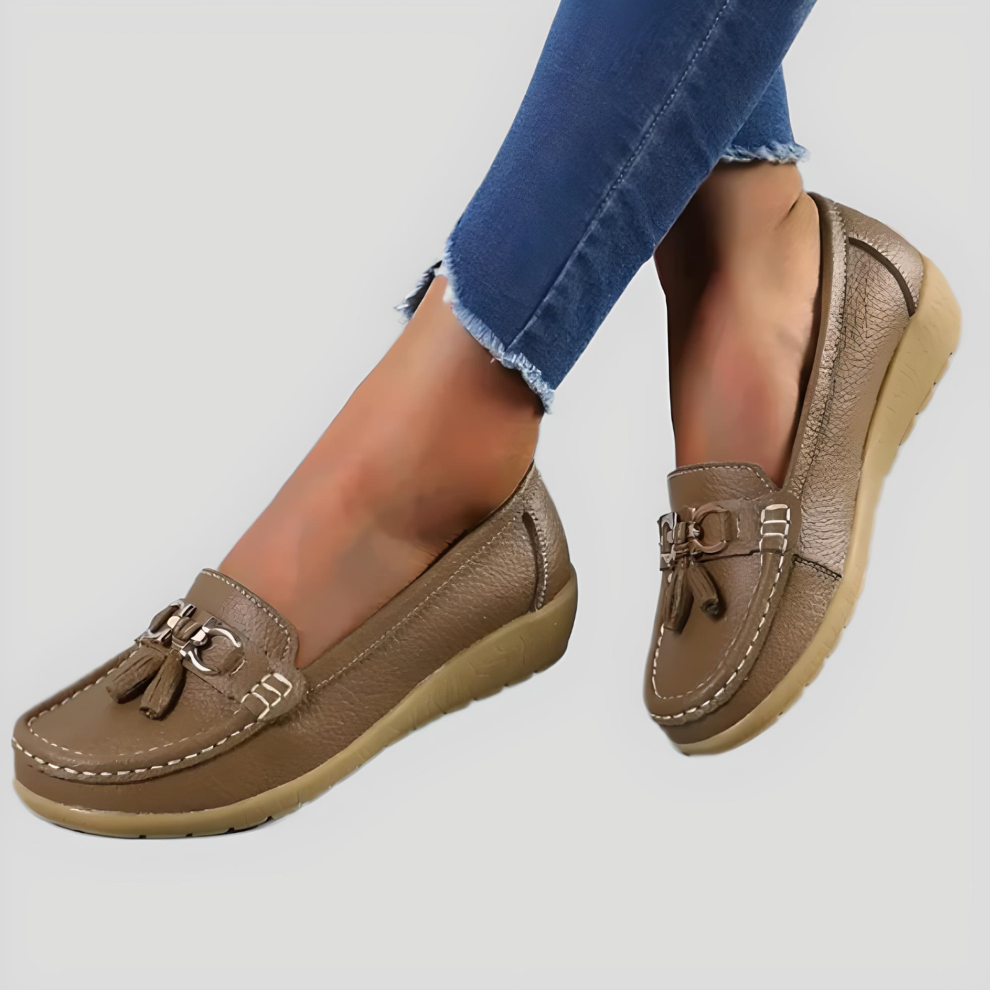 Braune Damen-Mokassins mit Quasten, Leder, bequeme Sohle, modische Freizeitschuhe.