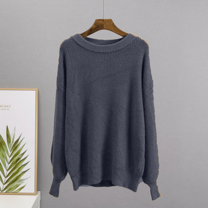 Grauer Strickpullover Damen, langärmelig, Rundhalsausschnitt, gemütlich, modisch, Herbstmode.