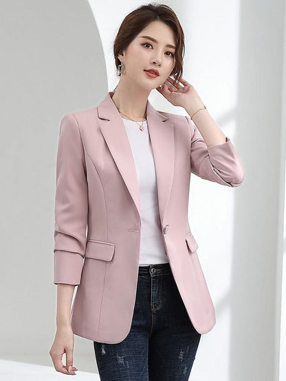 Damen Blazer rosa, eleganter Schnitt, 3/4-Ärmel, Business-Mode, stilvoll und modern.