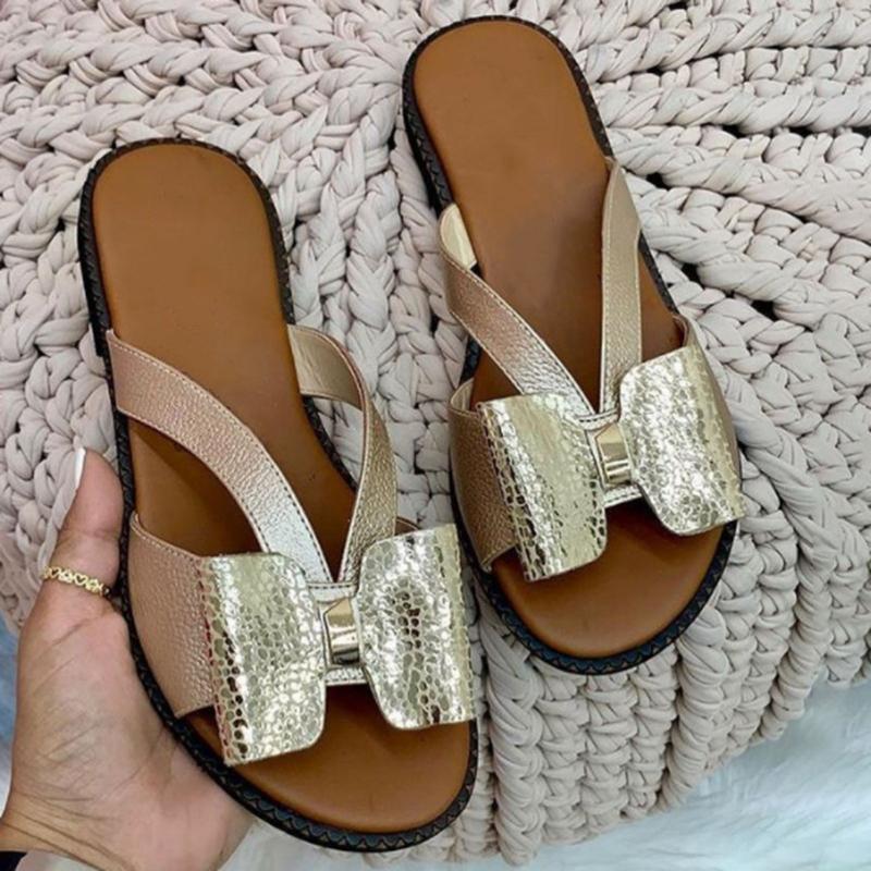 Goldene Damen-Sandalen mit Schleife, flach, Lederoptik, modisch, bequem, Sommermode.