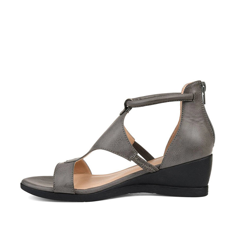 Graue Damen-Sandale mit Keilabsatz, Leder, Reißverschluss hinten, modisch und bequem.