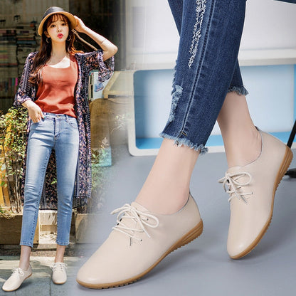 Beige Damen-Oxfordschuhe aus Leder, flach, mit Schnürung, ideal für Freizeitmode.