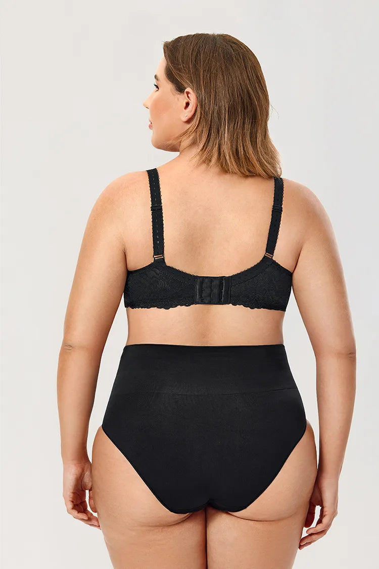 Frau in schwarzem Shapewear-Set, Rückansicht, nahtlos, figurformend, bequem, Plus-Size.