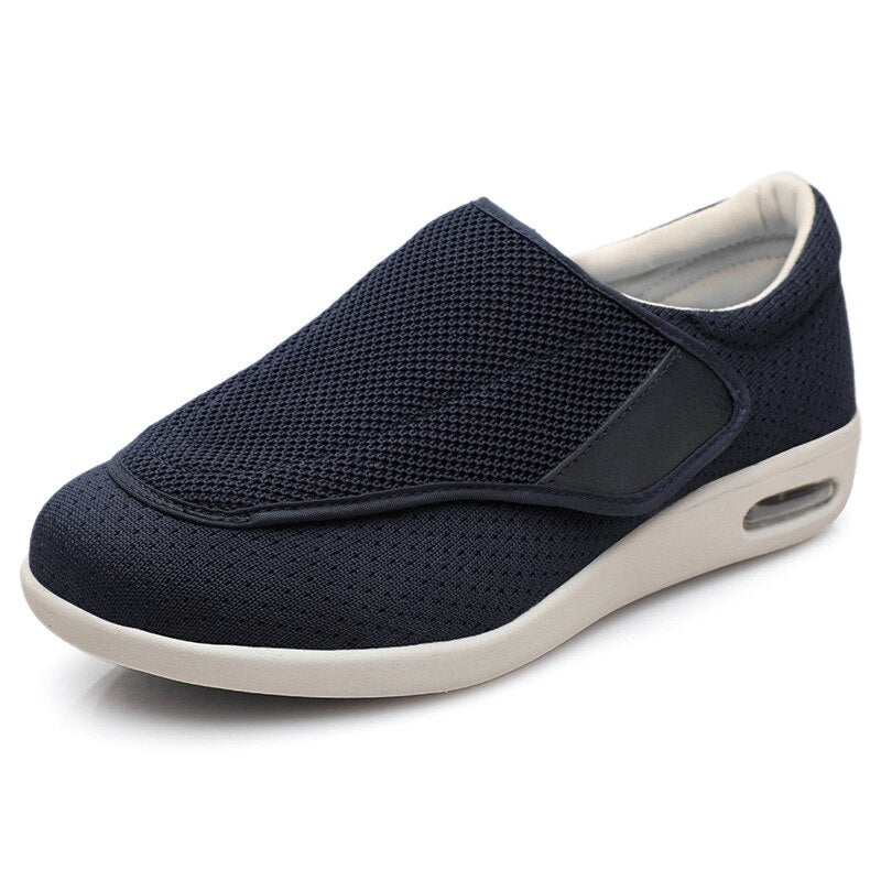 Dunkelblauer orthopädischer Schuh, atmungsaktiv, Klettverschluss, bequeme Sohle.