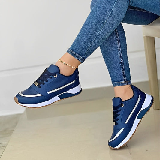 Blaue Damen-Sneaker, Leder, sportlich, bequem, modisch, mit weißer Sohle, ideal für Freizeit.