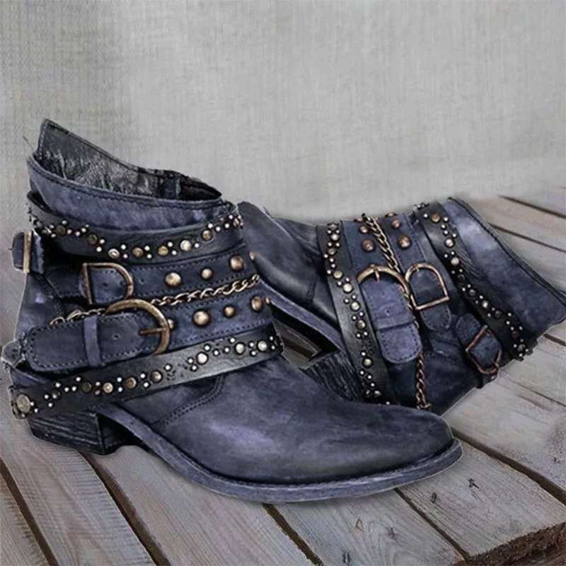 Schwarze Lederstiefeletten mit Nieten und Schnallen, Damenmode, Vintage-Stil.