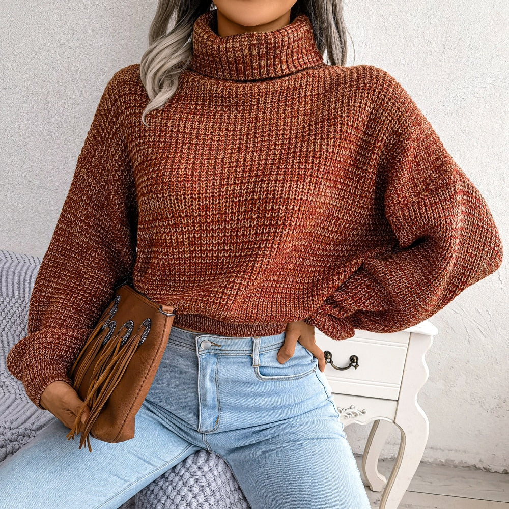 Frau in rotem Strickpullover, blaue Jeans, braune Tasche, Herbstmode, gemütlicher Look.