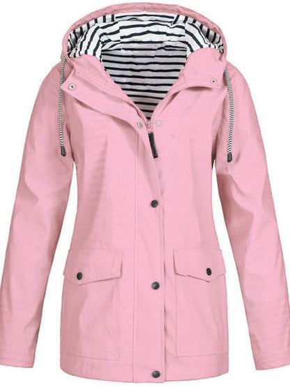Damen-Trenchcoat rosa, Kapuze, lange Ärmel, gestreiftes Innenfutter, Herbstmode 2023.