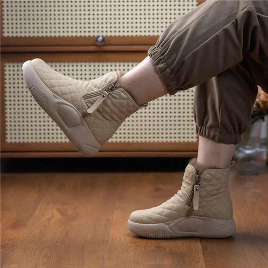 Beige Damen-Winterstiefel mit Reißverschluss, warm gefüttert, rutschfeste Sohle, modisch.