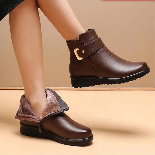 Damen Winterstiefel, braun, Kunstleder, mit Schnalle, warm gefüttert, rutschfeste Sohle.