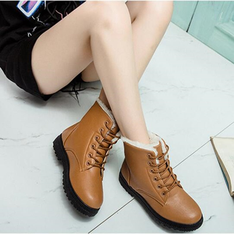 Damen Winterstiefel, braun, Kunstleder, gefüttert, rutschfeste Sohle, modisch, bequem.