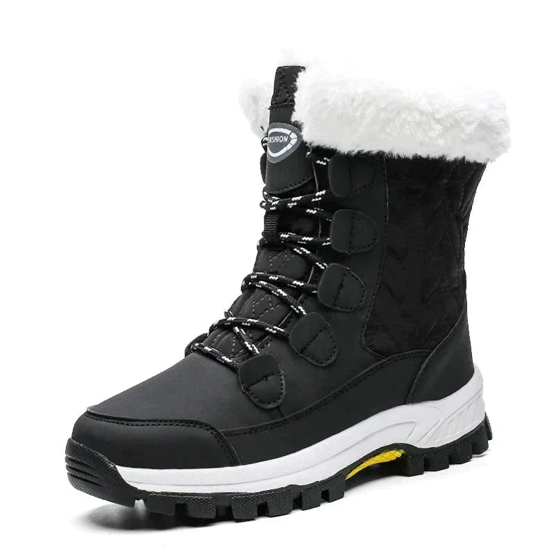 Schwarze Damen-Winterstiefel, mittelhoch, mit weißem Kunstfell, rutschfeste Sohle.